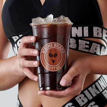 bikini barista holding cold brew coffee