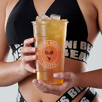 bikini barista holding iced green tea